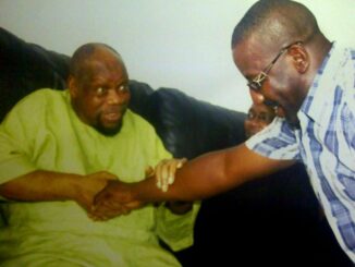 Ikemba of Nnewi, Chief Odumegwu Ojukwu in a warm handshake with his in-law Dr. Josef Onoh